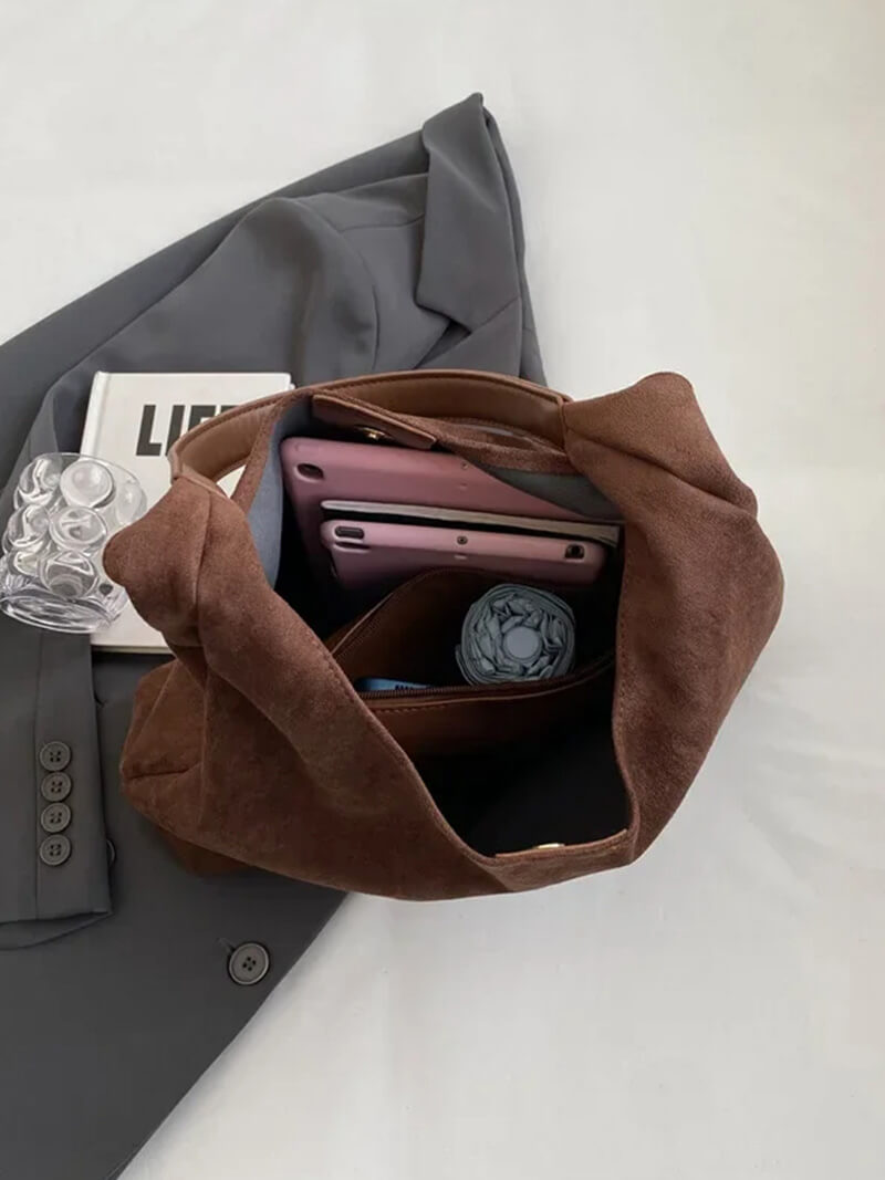 Handtasche in Wildlederoptik