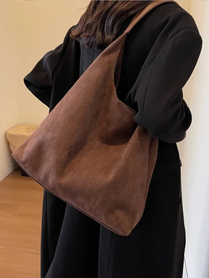 Handtasche in Wildlederoptik